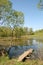 Wooden path on a rural pond