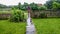 Wooden Pathway, Fencing, Outhouse, Rain