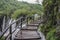 Wooden pathway near big waterfall, Plitvice Lakes National Park, Croatia