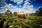 Wooden Pavilion among Plant Labyrinth in Modern Park