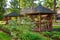 Wooden pavillion in recreation area, outdoor activities background