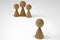 Wooden pawns Concept of social isolation, bullying. female discrimination, stalking and violence against woman