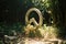 a wooden peace sign in the middle of a forest