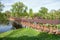 Wooden pedestrian bridge over river in Kolarovo, Slovakia