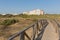 Wooden pedestrian bridge pathway from beach to apartments Torre la Mata Costa Blanca Spain