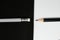 Wooden pencils, Black pencil turn pencil head to eraser of white pencil with black and white background, Contrast concept, School