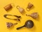 Wooden percussion instruments on yellow background