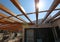 Wooden pergola on the roof of a villa