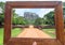 Wooden photoframe for composition with landscape of Sigiriya mountain and famous historical and archaeological site.