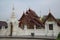 The wooden Phra Wihan is located in front of Panya Tharonusorn Pagoda or Golden Pagoda at Wat Pa Pathomchai.