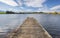 Wooden pier in beautiful lake at alps mountains