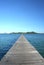 Wooden pier on blue lagoon