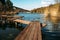 Wooden pier or bridge in lake for fishing and rest, tranquil nature landscape