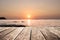 Wooden pier with de focus sunset view on the island