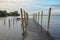 Wooden pier at Dutch lake in the early morning