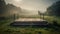 Wooden pier on a foggy meadow at sunrise in summer