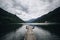 Wooden pier goes into pristine alpine lake