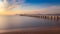 Wooden pier / jetty, playa de muro, Alcudia, sunrise, mountains, secluded beach, golden sunlight, reflection, beautiful sky,