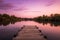 Wooden pier in Lake of Campo, Tuscany Italy