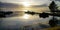 Wooden pier pontoon access boat in Biscarrosse lake sunrise