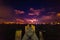 Wooden pier in Watson Island at night