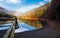 Wooden pierce fence on a lake in fog