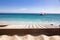 wooden plank sand and blue sea in the background