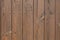 Wooden planks painted brown. Background texture