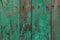 Wooden planks painted green.