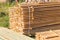 Wooden planks from sawmill for house roof construction