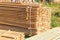 Wooden planks from sawmill for house roof construction