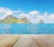 Wooden platform with blurred beautiful seascape of chicken island, Thailand