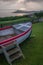 Wooden play boat on a campsite