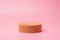 Wooden podium stage isolated on pink background for use show product concept minimal with copy space