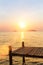 Wooden pontoons on the coast during sunset. Nature.