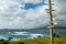 Wooden Post with Direction Signs at Hanga Roa Waterfront