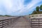 Wooden promenade among sand dunes along the Baltic Sea