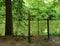 Wooden Public Footpath Sign by a forest lake