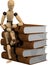 Wooden puppet and books