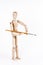 Wooden puppet holding painting brush