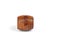 The wooden puzzle barrel is fully assembled isolated on a white background