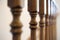 Wooden Railing of an luxury antique staircase, woodwork elements macro photograpy, retro design beautiful interior of a