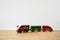 Wooden railway and train at home on the floor. Creative play toys