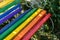 Wooden rainbow bench in the park