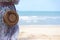 Wooden rattan  Bali bag with beach at background