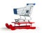 Wooden red sled with shopping cart