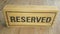 Wooden reserved sign