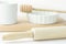 Wooden Rolling Pin Honey Dipper White Baking Form Measuring Cup on Table Pastry Holiday Cooking Bakery