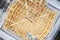 Wooden roof truss beams during construction building of a house aerial view