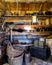 Wooden room filled with ancient household items. room of Antiques.